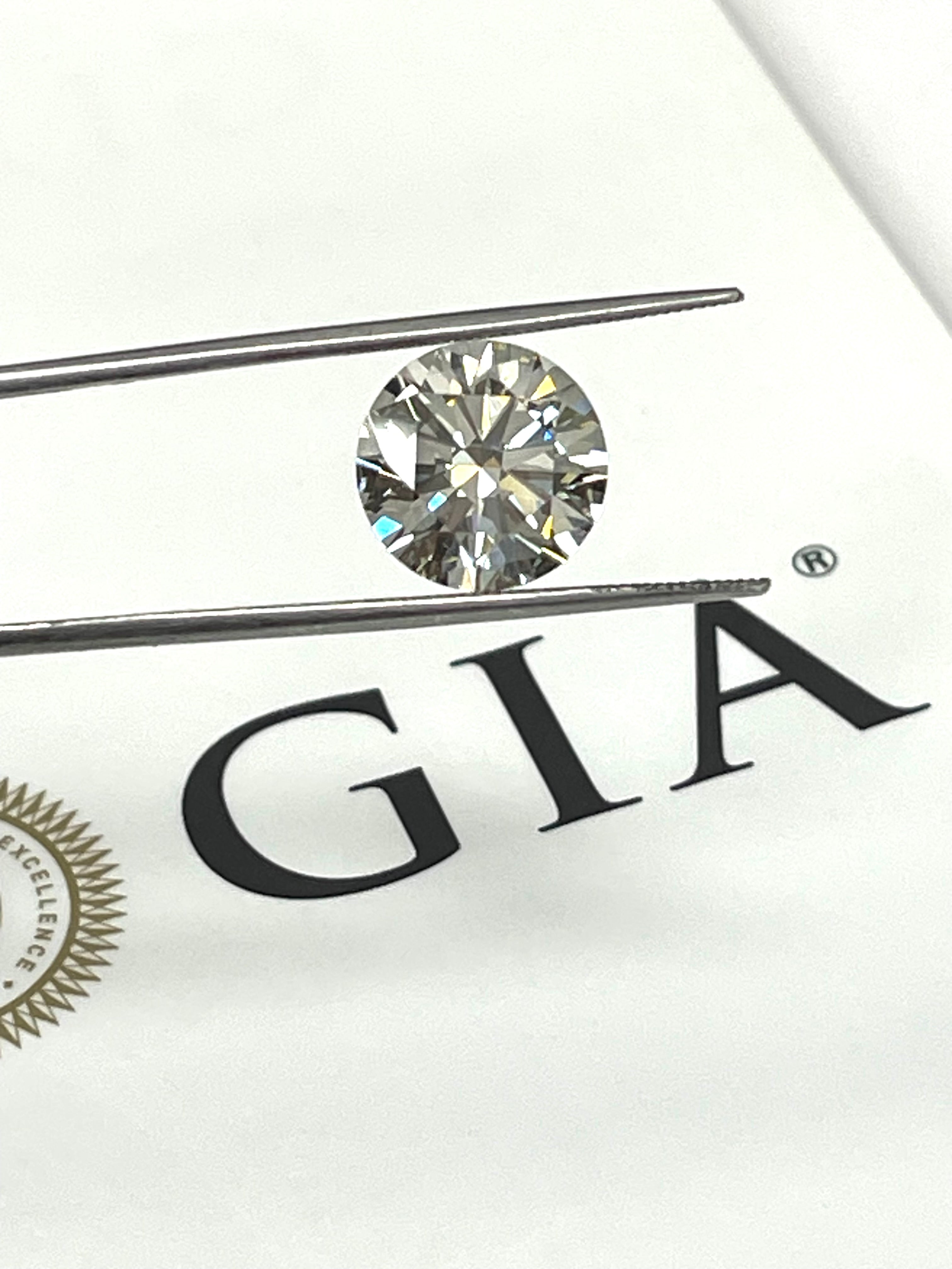 GIA Certified Natural Fancy Light Gray Diamond 5.01 Carats Free Setting 18kt