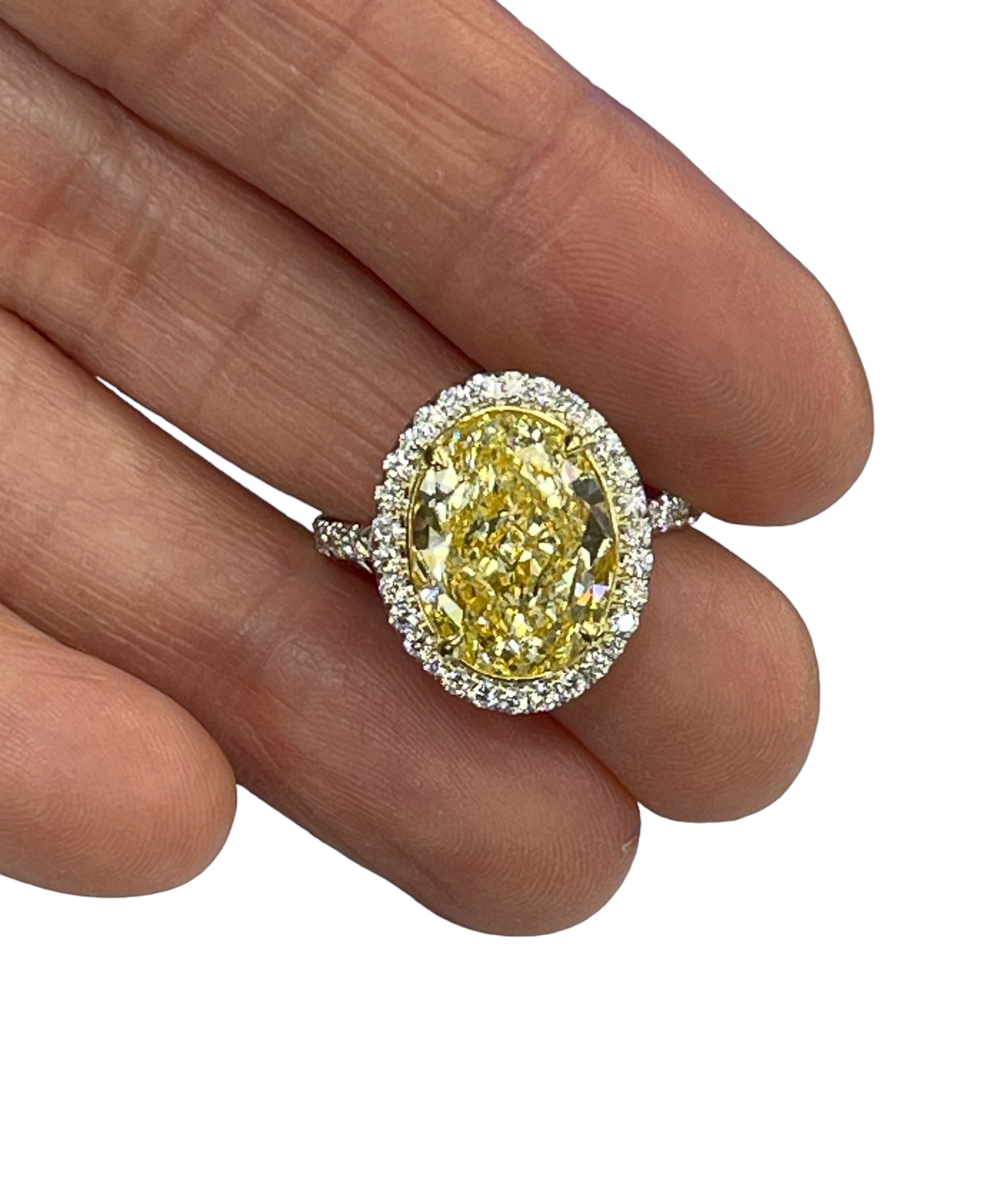 Oval Brilliant Fancy Yellow Diamond Engagement Ring GIA Certified
