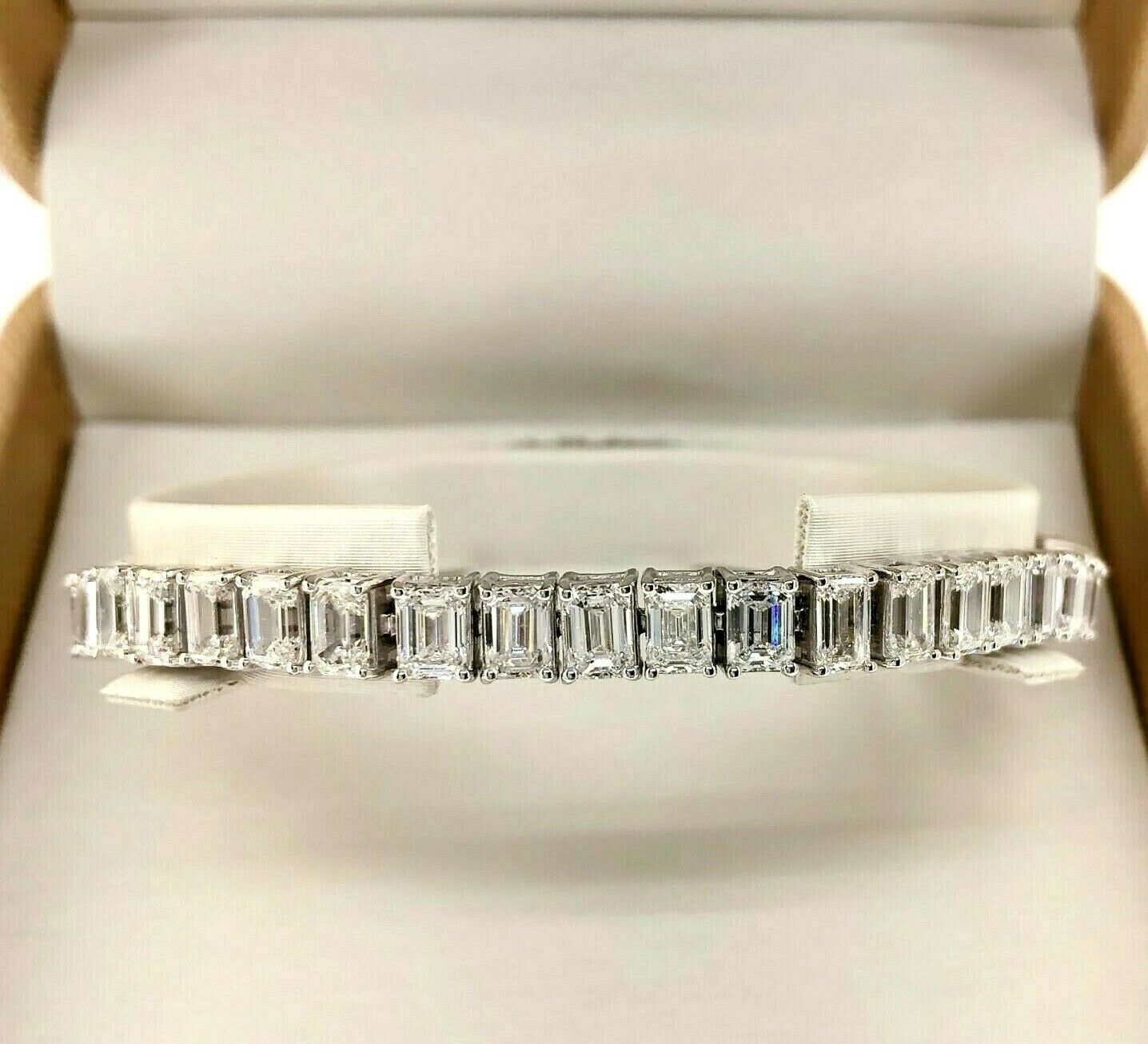 23.01 Carats t.w. Emerald Cut Diamond Tennis Bracelet 18K Gold 0.50 ct Diamonds