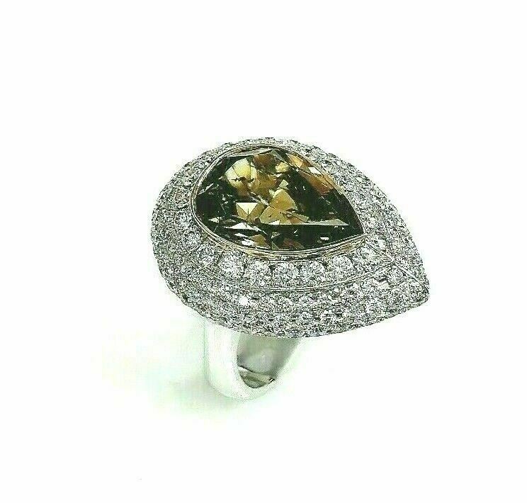 12.41 Carats t.w. GIA Pear Shape Natural Fancy Dark Brown w Puffed Halo Ring 18K