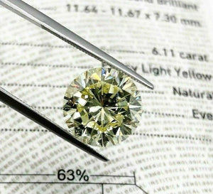 Loose GIA Diamond Very Large 6.11 Carats GIA Light Fancy Yellow Round Brilliant