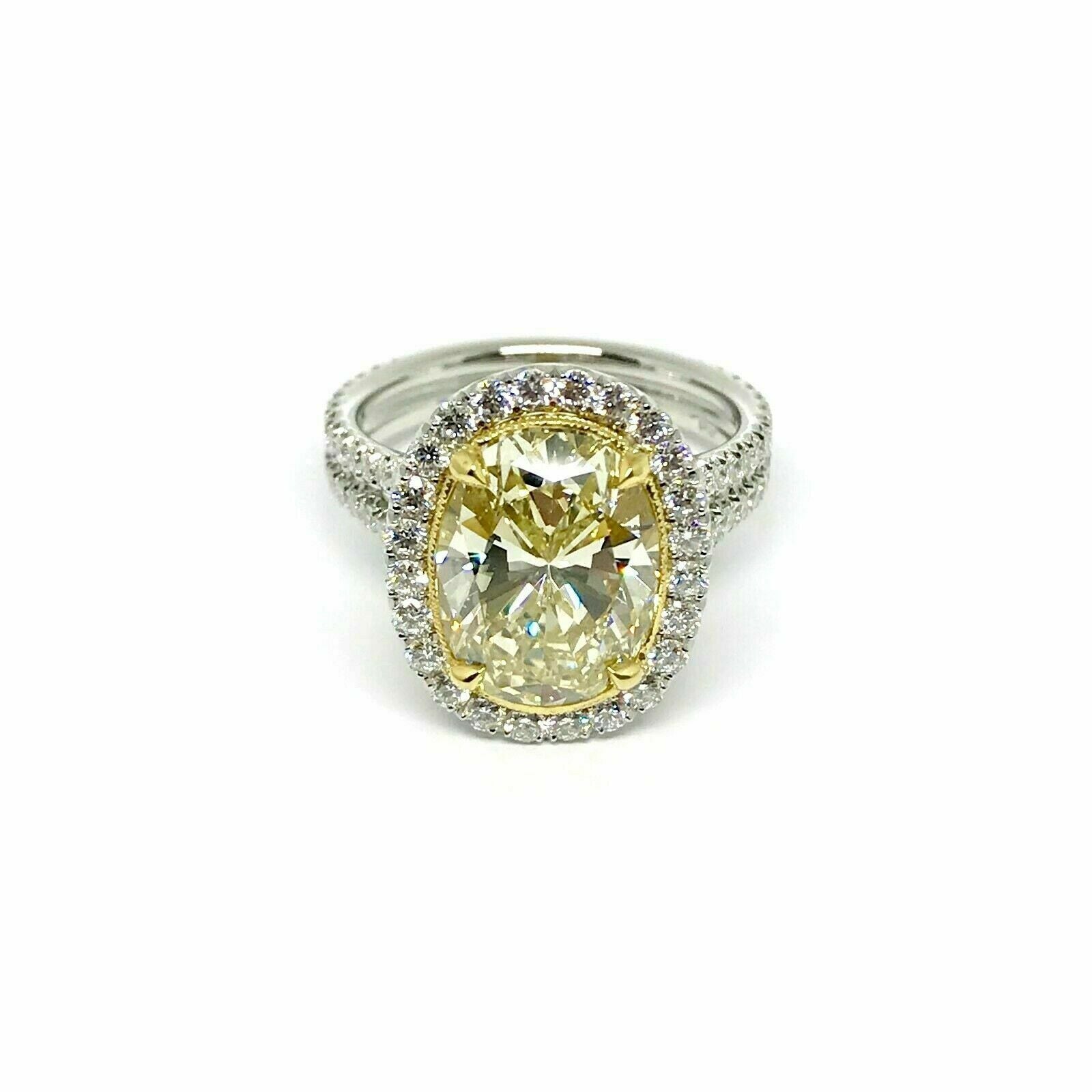 Platinum Ring GIA Certified 4.02Ct. Natural Fancy Light Yellow Oval Diamond