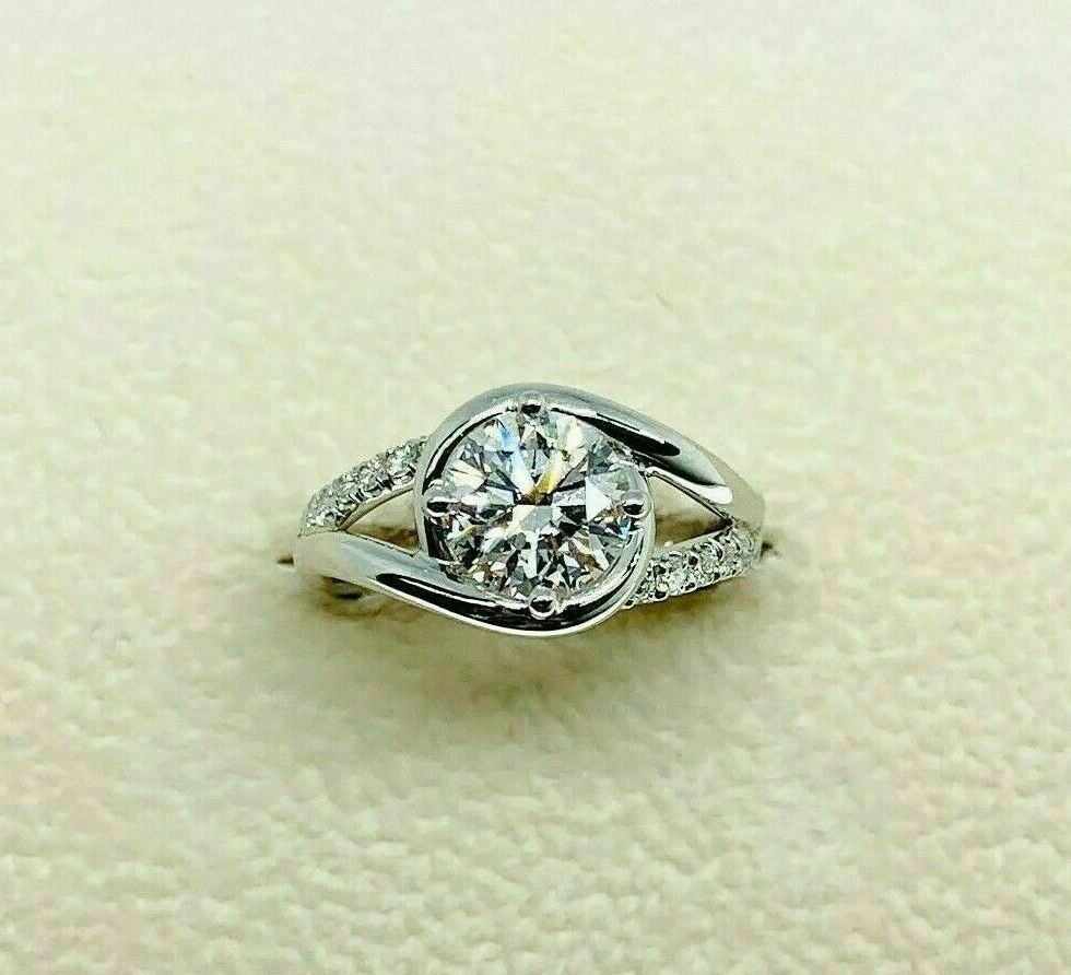 1.55 Carats tw Round GIA E VS2 3EX Cut Bypass Platinum Hand Made Engagement Ring