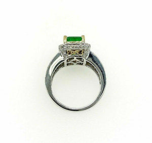 3.19 Carats t.w. Diamond and Emerald Halo Ring Emerald is 2.40 Carats 18K 2Tone