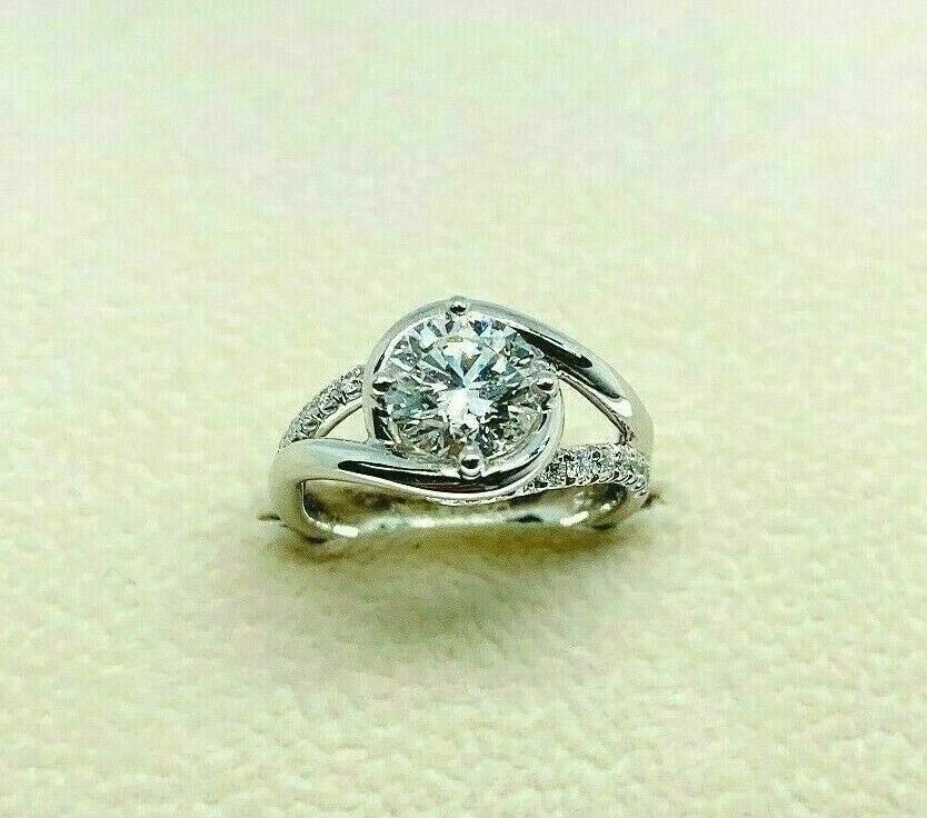 1.55 Carats tw Round GIA E VS2 3EX Cut Bypass Platinum Hand Made Engagement Ring
