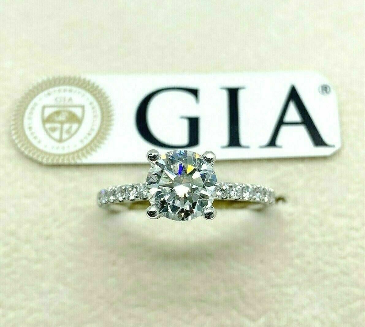 1.44 Carats t.w. Round GIA E SI1 Under Halo Hand Made Engagement Ring 18K Gold