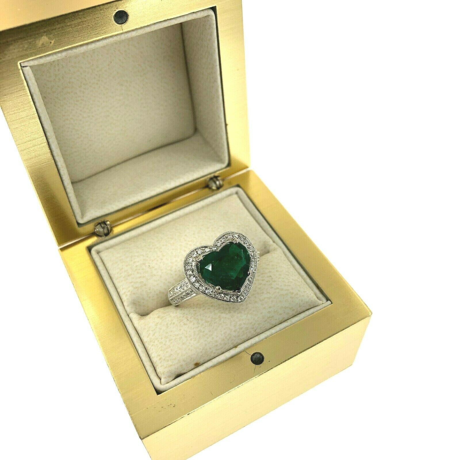 2.08 Carats t.w. Diamond and Emerald Halo Ring 18K Gold Emerald is 1.68 Carats