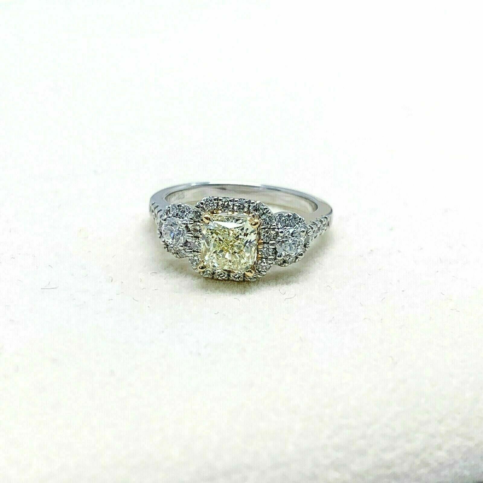 1.65 Carats t.w. Fancy Yellow VS1 Radiant Diamond Halo Engagement Ring 14k