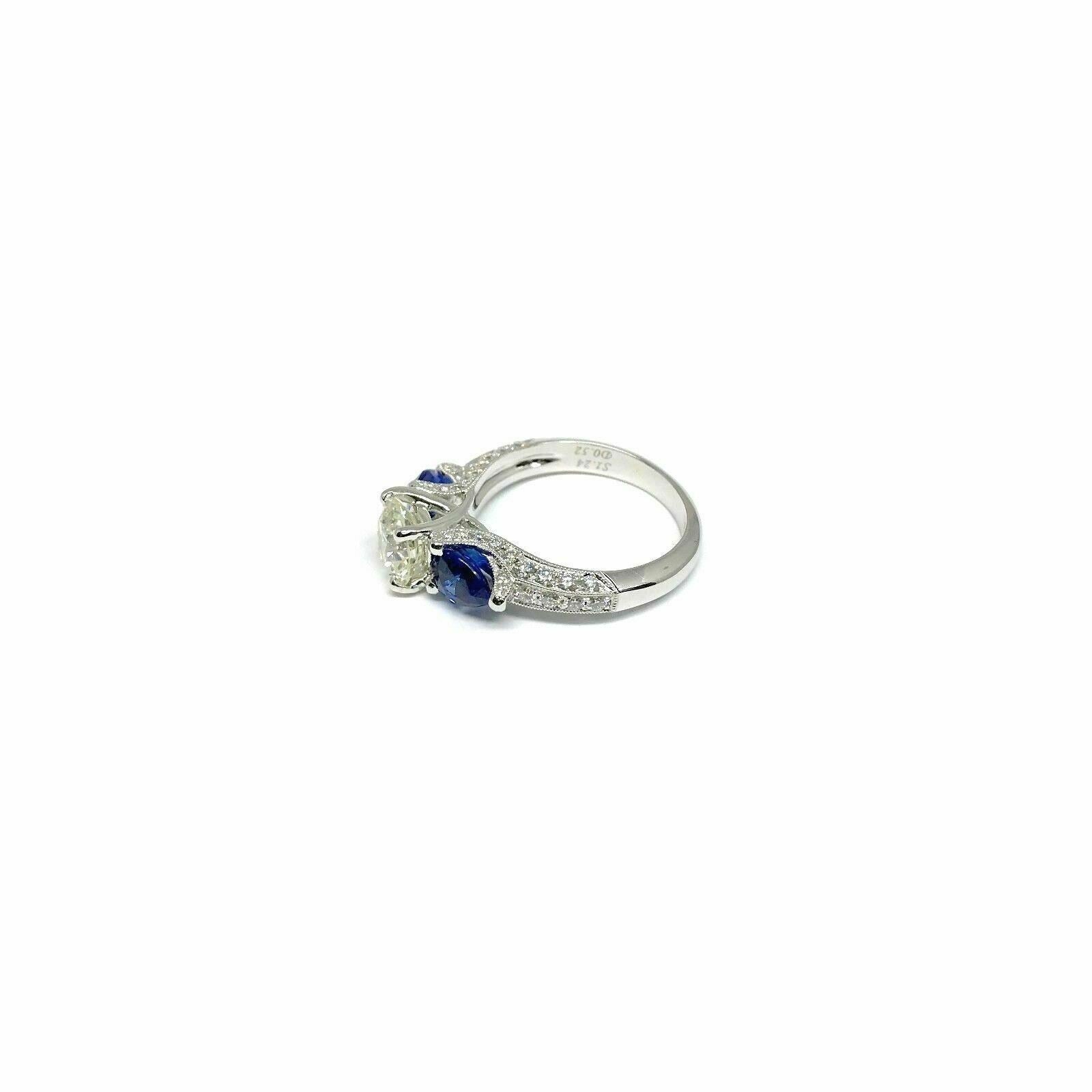 18K White Gold Ring w/EGL Certified 1.29ct RBC Diamond & 2 Pear Shape Blue Sapp