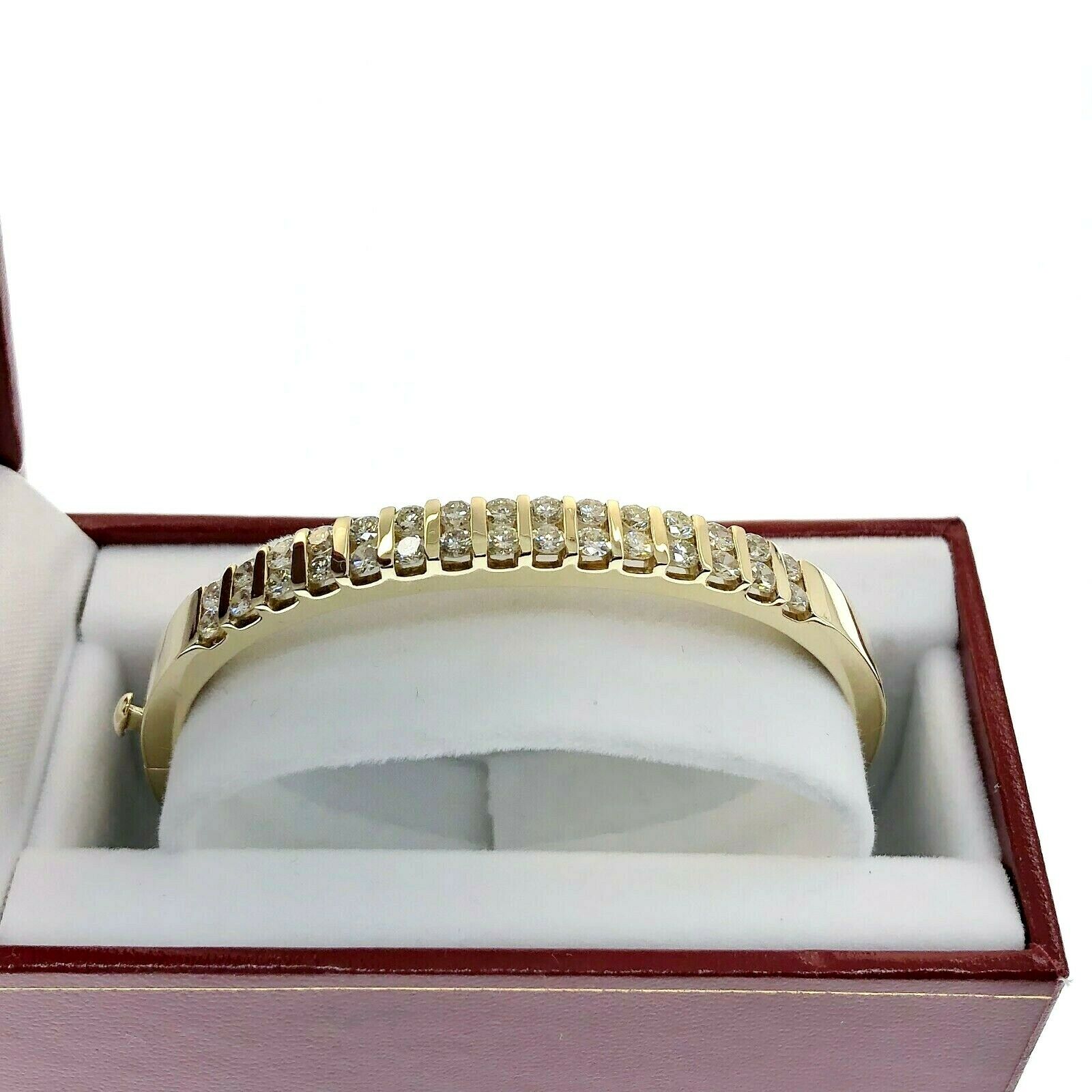 2.50 Carats t.w. Diamond Channel Set Bangle Bracelet 14K Yellow Gold 27 Grams