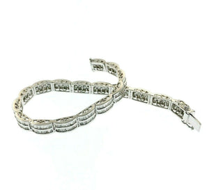 Fine 4.11 Carats t.w. Channel Set Baguette Cut Diamond Tennis Bracelet 18K Gold
