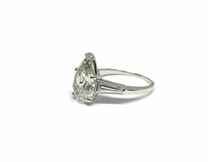 Platinum Ring with GIA - I/VS1 3.01ct Pear shape Diamond and 2 side baguettes