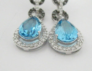 10.36 TCW Natural Pear Blue Topaz Black Diamonds Dangling Earrings 14k WG