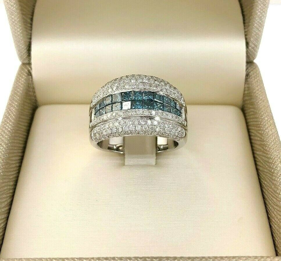 2.34 Carats t.w. Blue and White Diamond Invisible Set and Pave Anniversary Ring