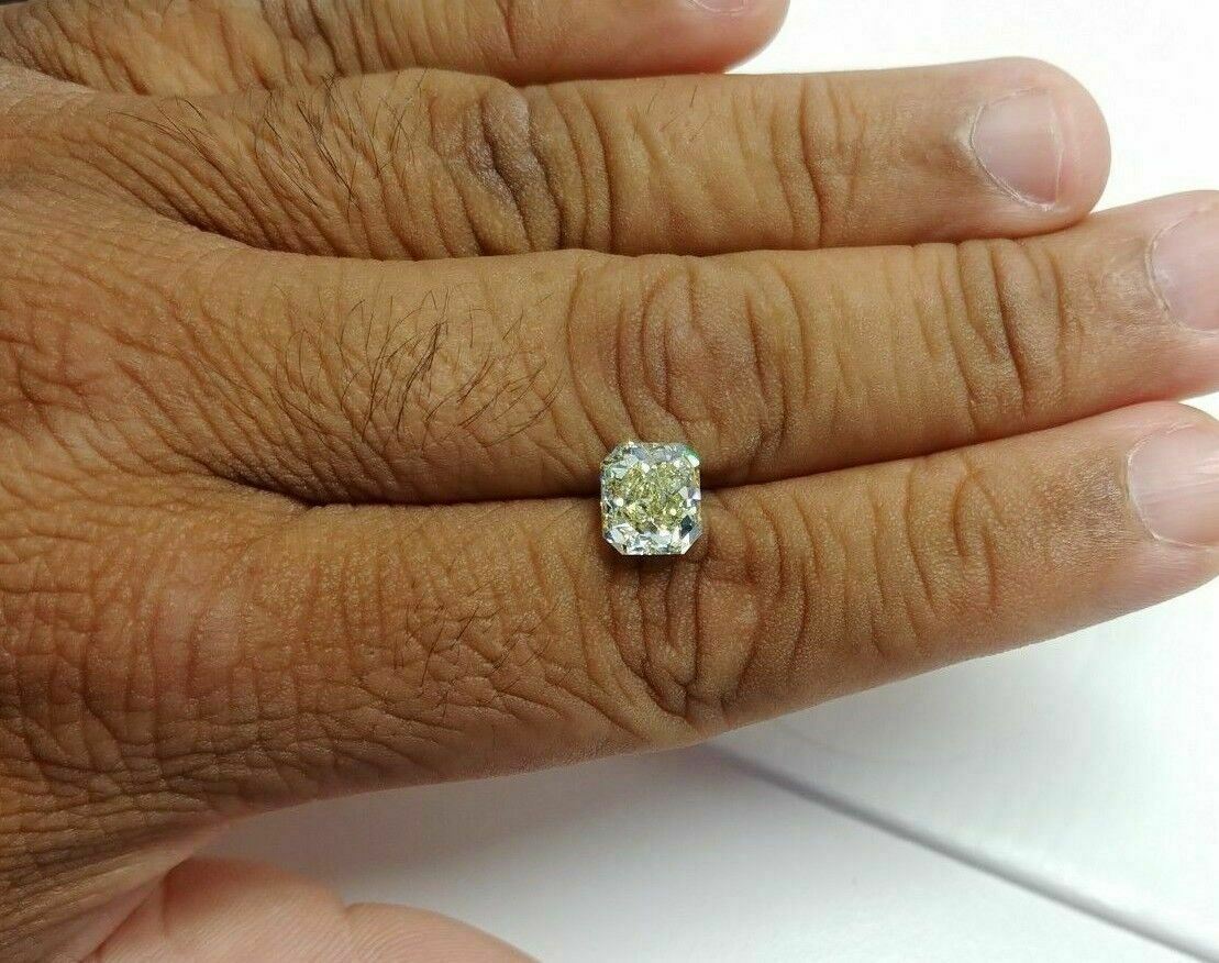 3.14 RADIANT CUT - NATURAL FANCY LIGHT YELLOW - VVS1 DIAMOND - GIA#2185724359