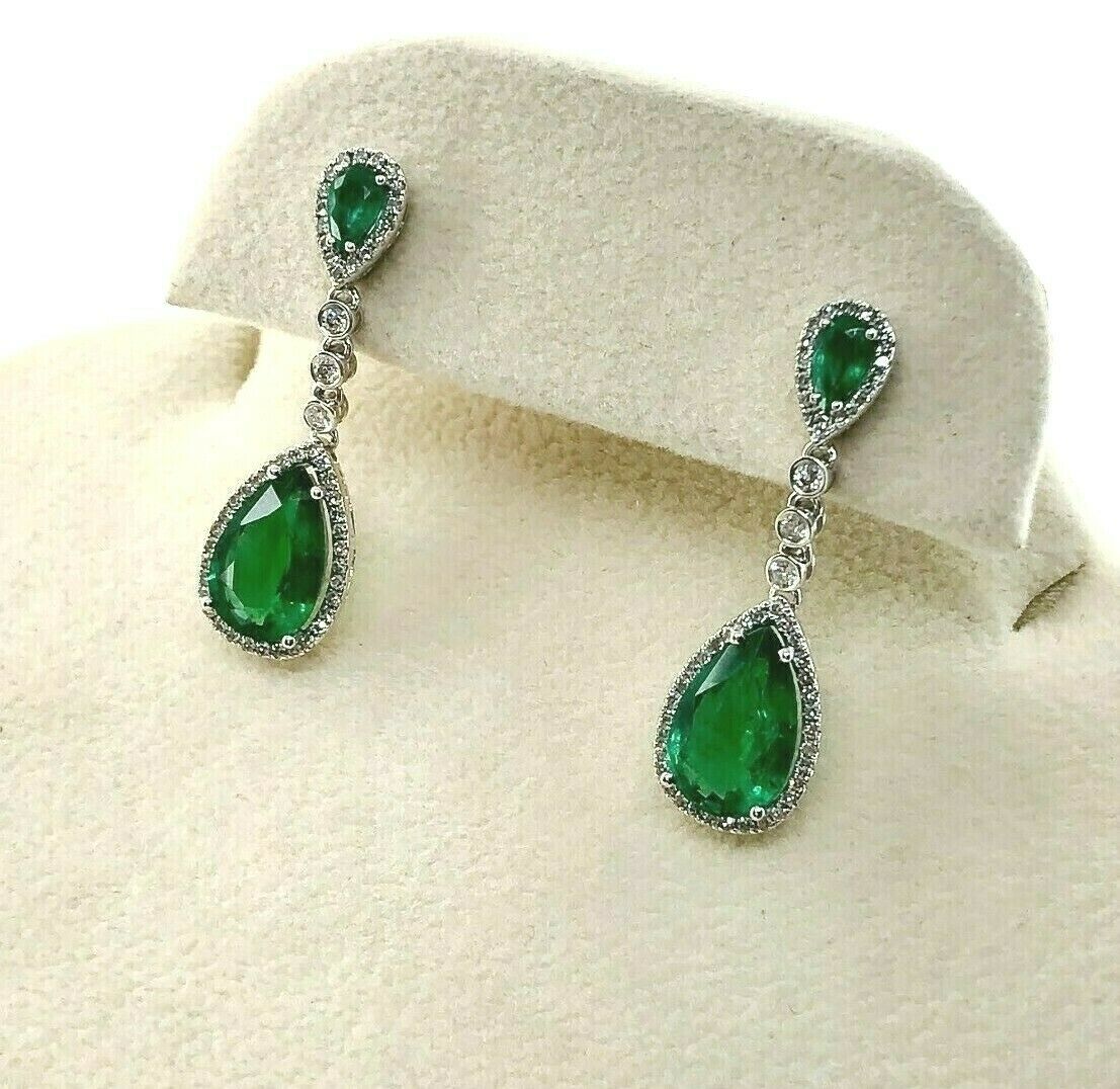 3.72 Carats t.w. Emerald and Diamond Dangle Earrings Emeralds are 3.32 Carats tw