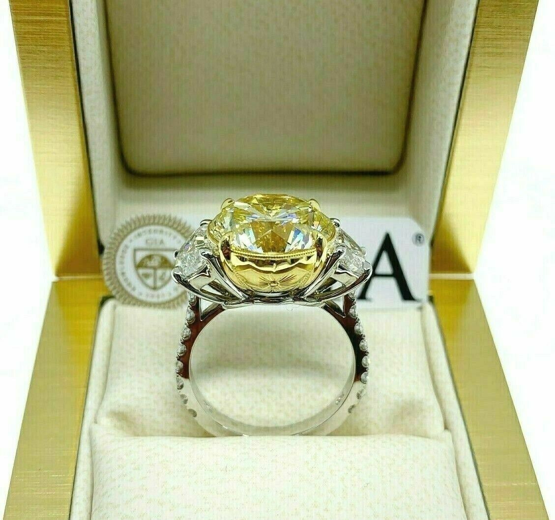 GIA Certified 6.11 Ct. Natural Fancy Light Yellow Round Diamond Platinum18 Ring