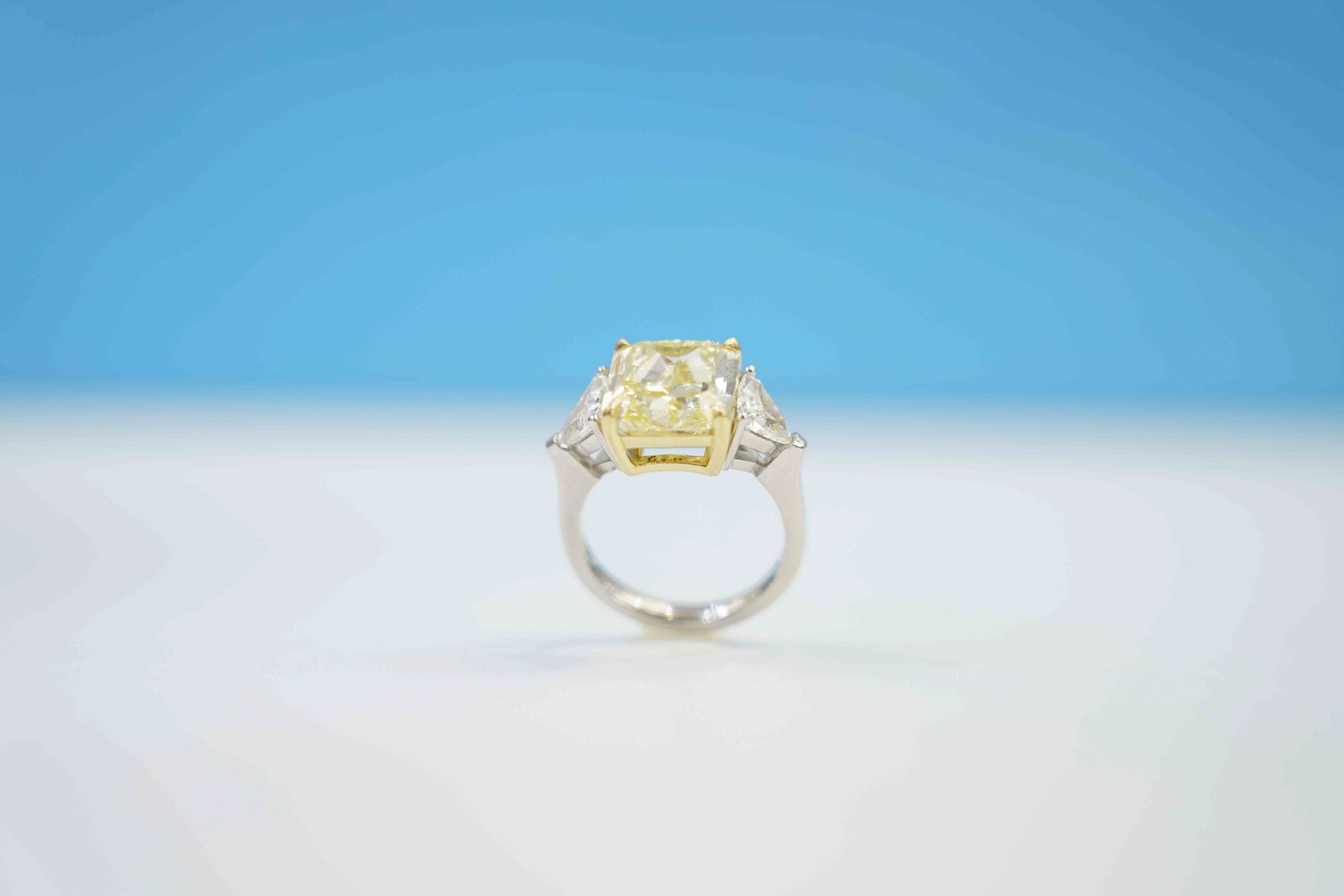 Custom Made 3.50 Carats Emerald Cut Fancy Yellow Diamond with .47 Carat SS