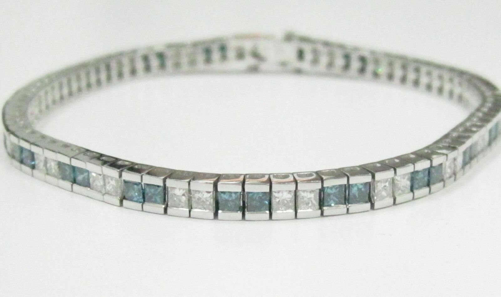 6.17 TCW Natural Blue and White Princess Cut Diamond Tennis Bracelet 14k WG