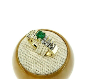 Fine 0.85 Carats t.w. Diamond and Colombian Emerald Channel Set Ring 18K Gold