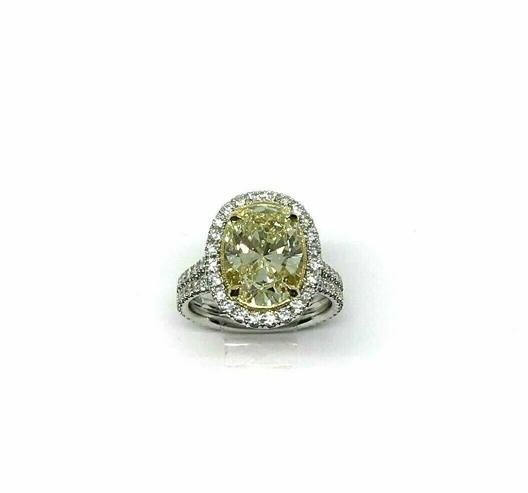 Platinum Ring GIA Certified 4.02Ct. Natural Fancy Light Yellow Oval Diamond