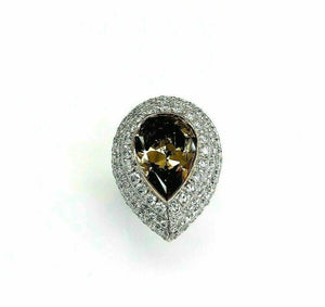 12.41 Carats t.w. GIA Pear Shape Natural Fancy Dark Brown w Puffed Halo Ring 18K