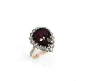 6.49 Carats t.w. Diamond and Ruby Halo Ring Ruby is 5.48 Carats 14K Rose Gold
