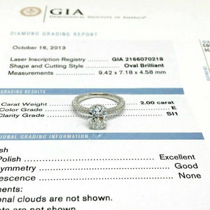 2.52 Carats Oval GIA E SI1 3 Side Under Halo Platinum Hand Made Engagement Ring