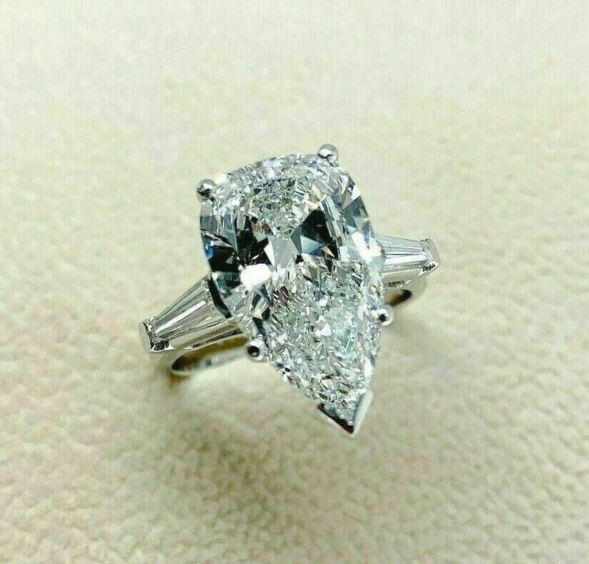4.64 Carats tw. Pear Shape Center Diamond Engagement Ring GIA 4.34 E SI 1 Center