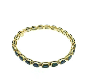 Fine 15.00 Carats t.w. Blue Sapphire Bezel Set Tennis Bracelet 14K Yellow Gold