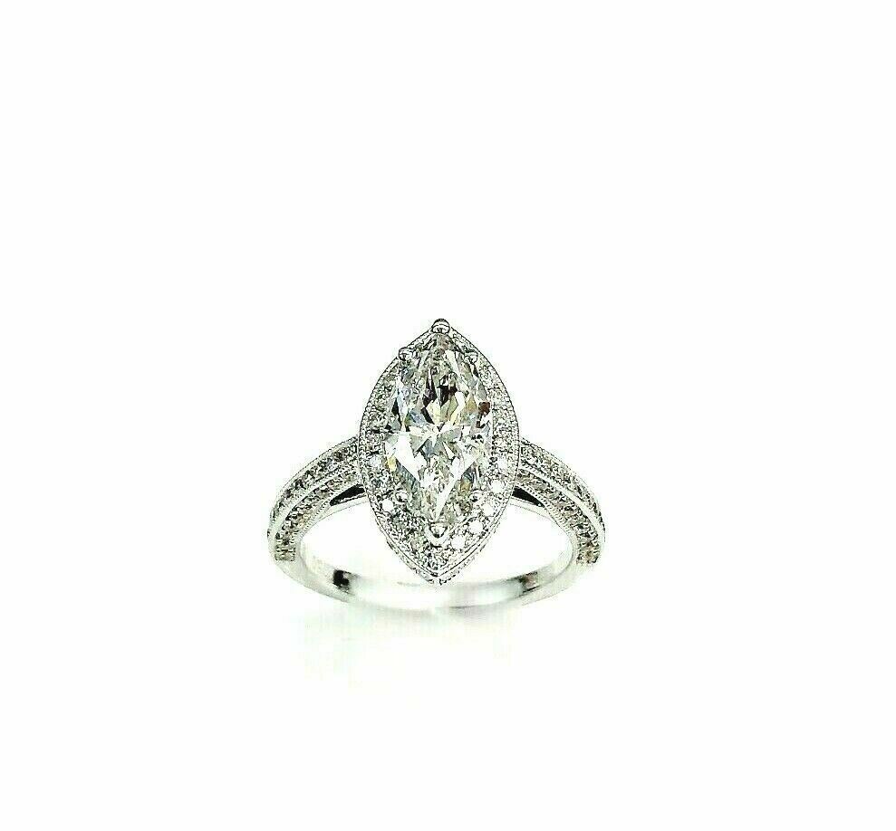 3.16 Carats t.w. Marquise Halo 3 Sided Diamond Engagement Ring 2.01 G SI1 Center