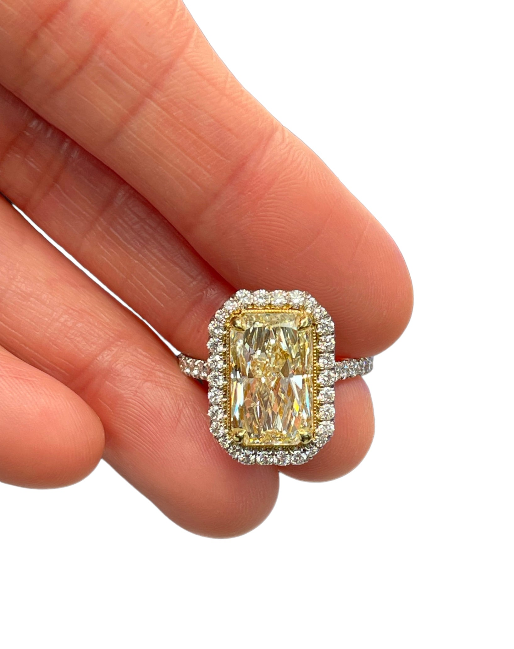 Certified Fancy Light Yellow Radiant Diamond Engagement Ring 4.62 Carats