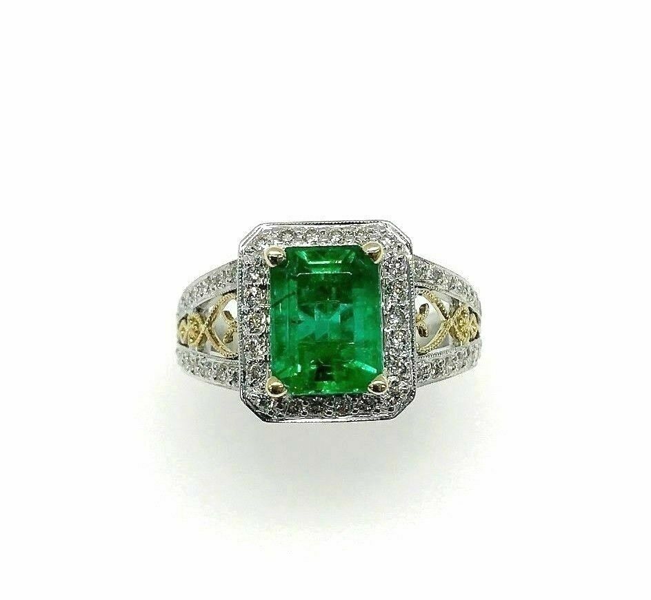 3.19 Carats t.w. Diamond and Emerald Halo Ring Emerald is 2.40 Carats 18K 2Tone