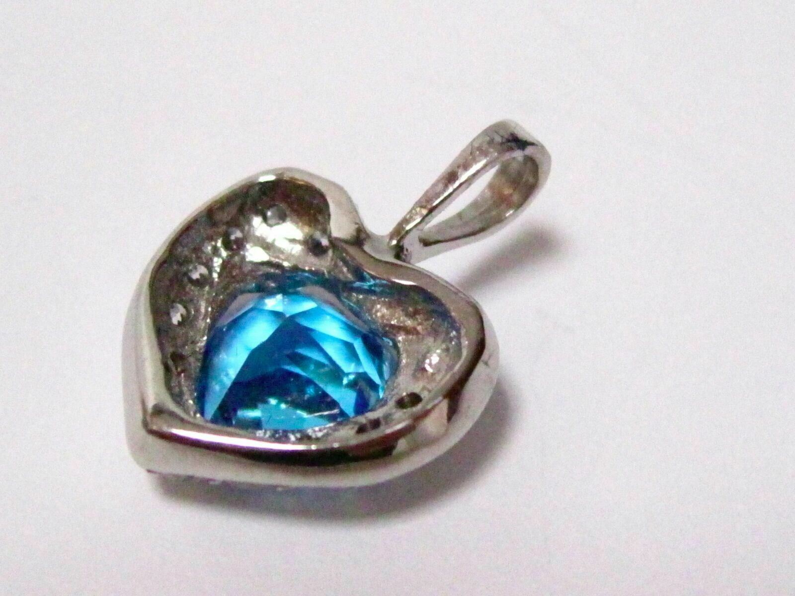 3.26 TCW Natural Heart Shape Blue Topaz & Diamond Pendant G SI1 14k White Gold