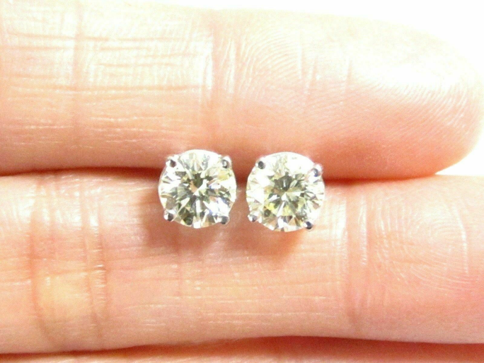 1.10 TCW Round Brilliant Cut Diamond Stud Earrings H I1 14k White Gold