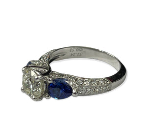 Round Brilliant Diamond Solitaire Ring With Blue Sapphire Accents White Gold