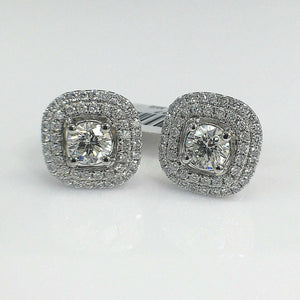 2.83 Carats t.w. Diamond Halo Earrings Center Diamonds are 1.41 Ct t.w. 18K Gold