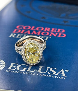 Oval Brilliant Fancy Yellow Diamond Engagement Ring 18kt