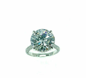 6.31 Carats t.w. F SI2 Round Cut Diamond Under Halo Engagement Ring 5.35 Center