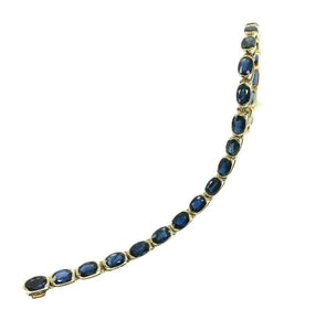 Fine 15.00 Carats t.w. Blue Sapphire Bezel Set Tennis Bracelet 14K Yellow Gold