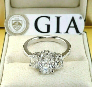 2.34 Carats 3 Oval Diamond Engagement Ring 1.50 Carat GIA D Color Center Stone