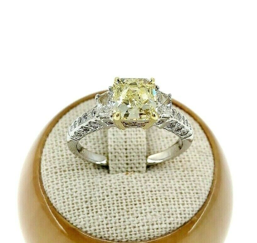 GIA 2.60 Carats t.w. Radiant Fancy Yellow VS1 Trapezoids Diamond Engagement Ring
