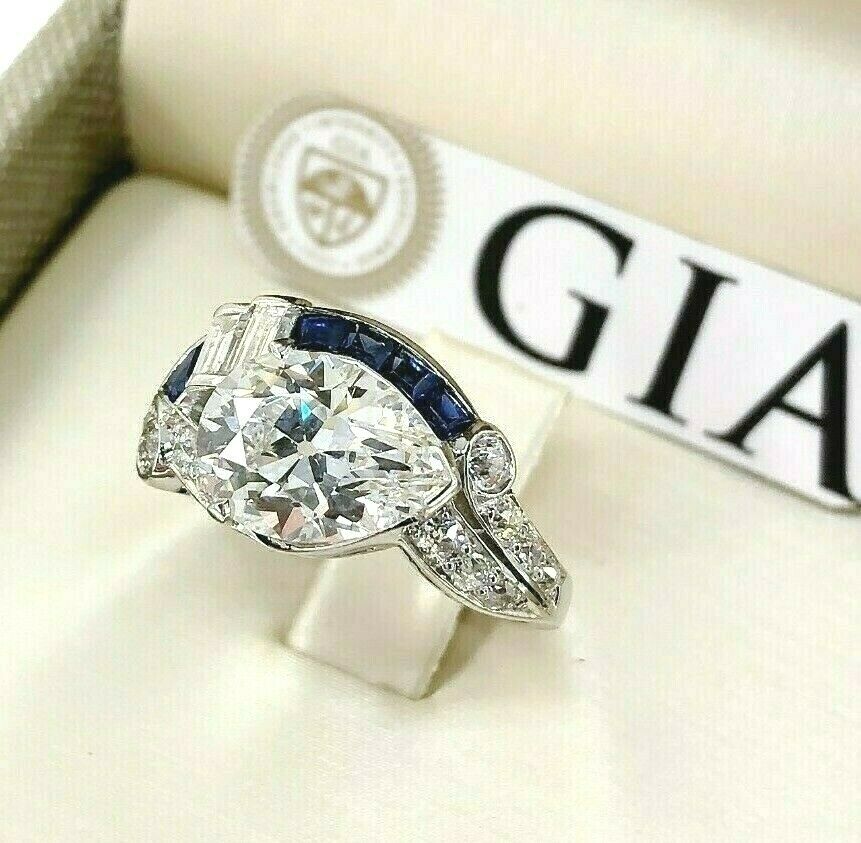 3.46 Carats Antique GIA Pear and Sapphire Engagement Ring 2.55 F VVS1 Center