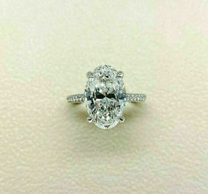 5.34 Carats t.w. F VS2 Oval Cut Diamond Under Halo Engagement Ring 4.50 Center