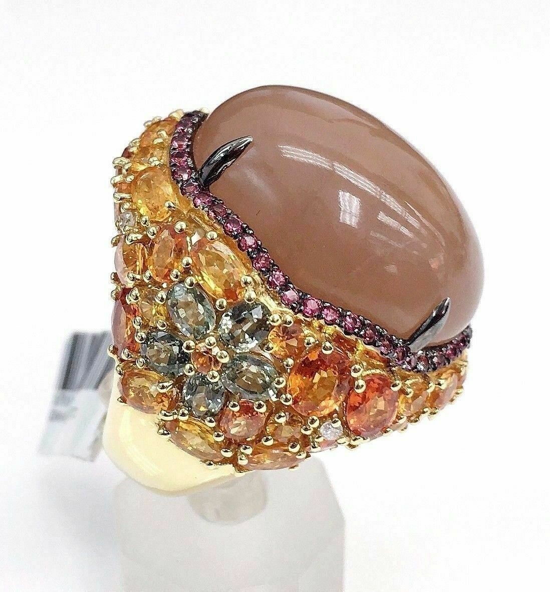 51.98 Carats t.w. Custom Made Ring with Sapphires,Diamonds and Quartz 18K Gold