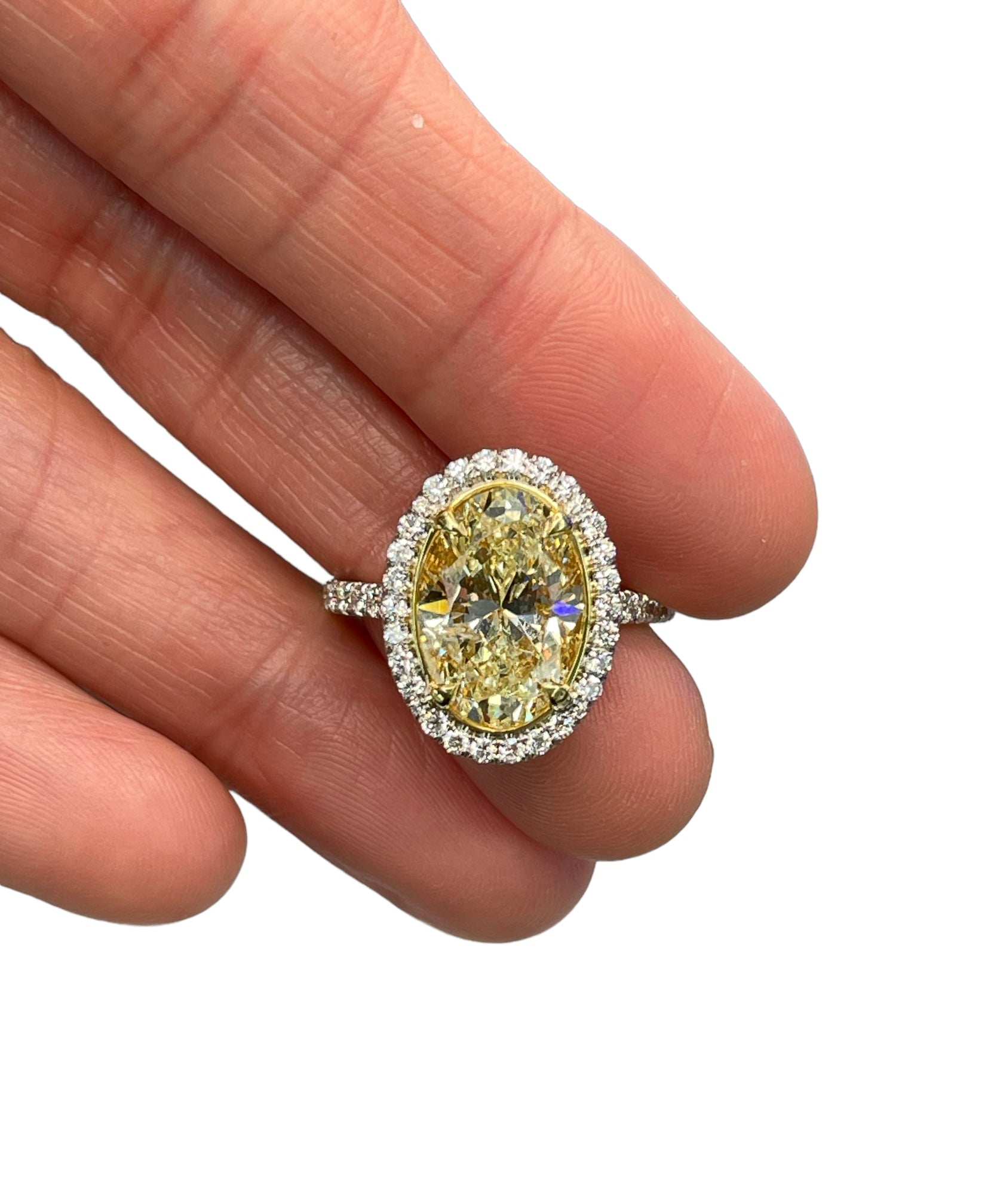 Certified Fancy Yellow Oval Diamond Engagement Ring 4.01 Carats