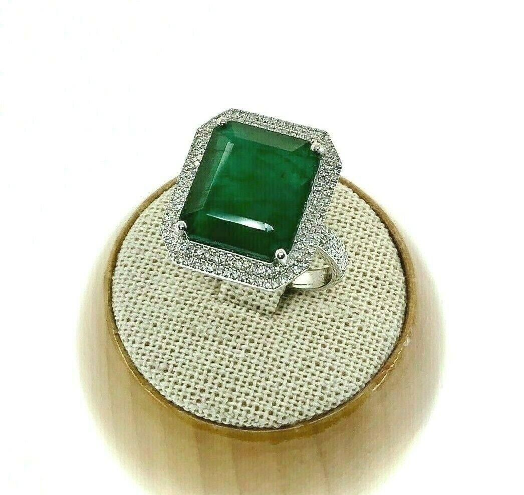 8.77 Carats t.w. Diamond and Emerald Halo Pave Set Ring Emerald is 8.32 Carats