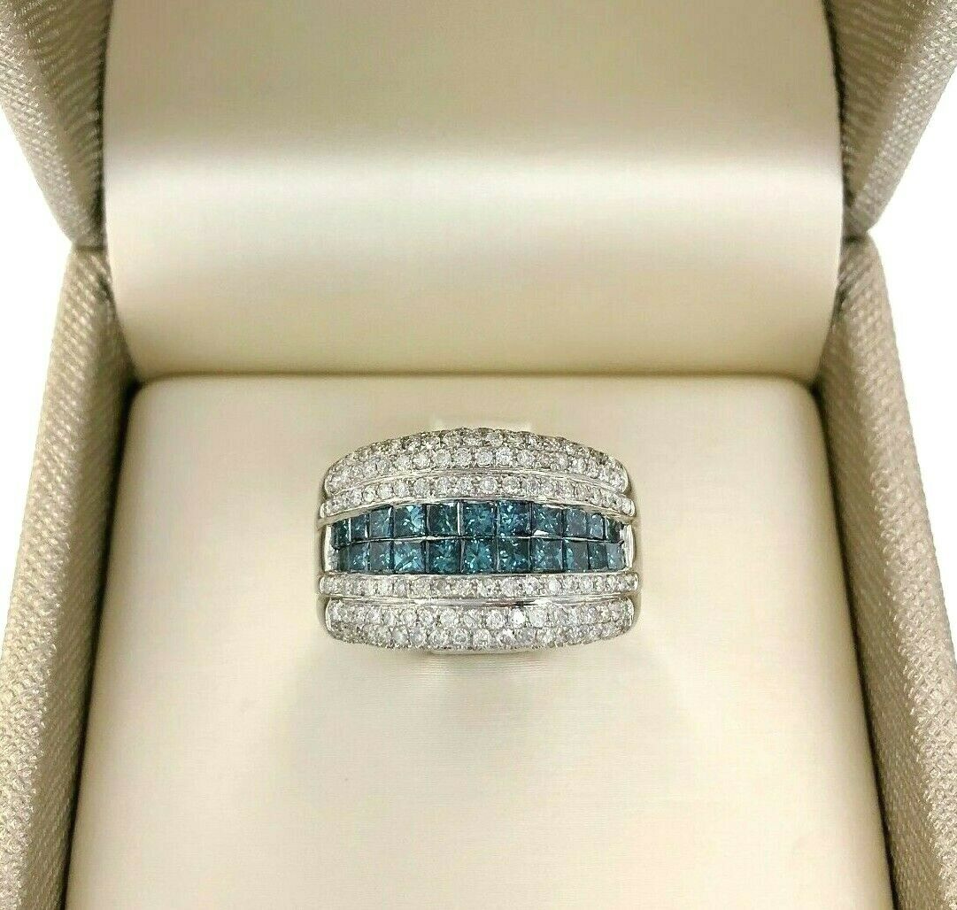 2.34 Carats t.w. Blue and White Diamond Invisible Set and Pave Anniversary Ring