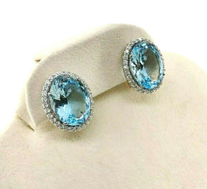 Fine 20.96 Carats t.w. Swiss Blue Topaz and Diamond Halo French Clip Earrings