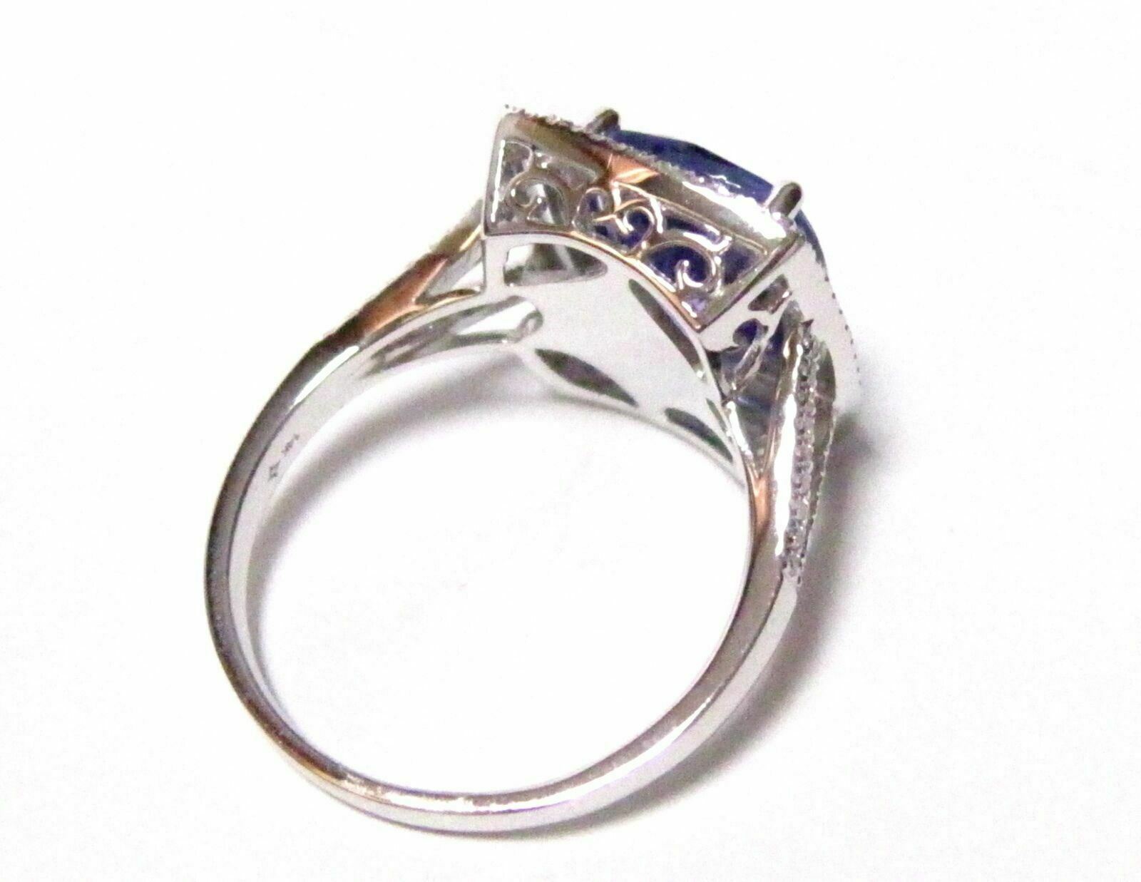 4.11 TCW Radiant Blue Tanzanite & Diamond Accents Ring Size 7 14k White Gold